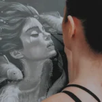 Artist Lana Vender working on an oil painting